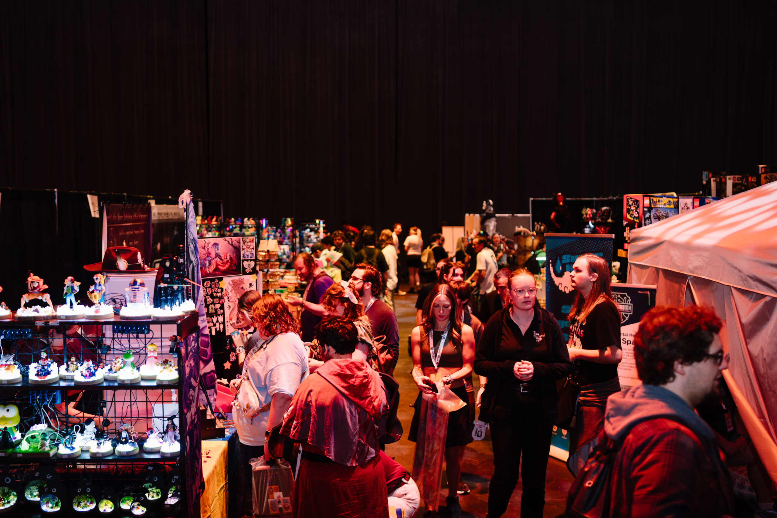 A full aisle of independent artists and the fans who came to collect.